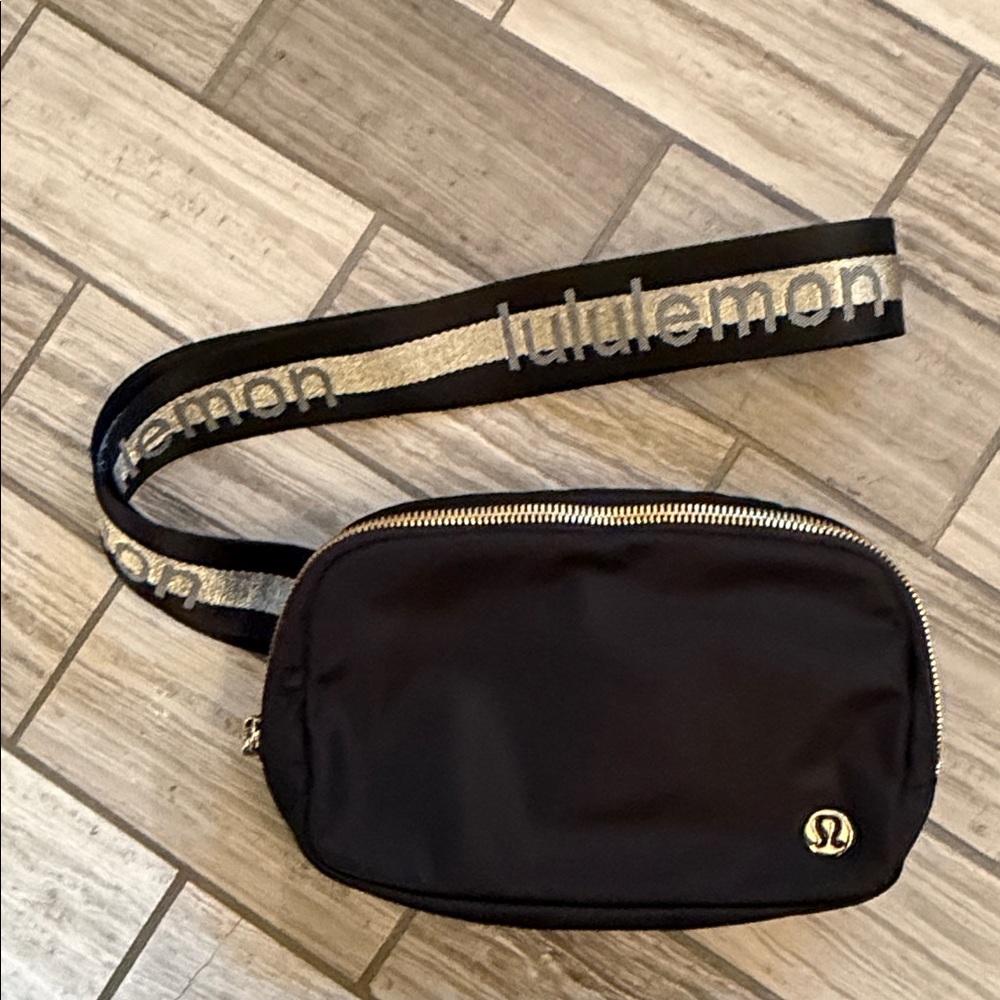 lululemon athletica Black cross body  Bag with Gold Accents